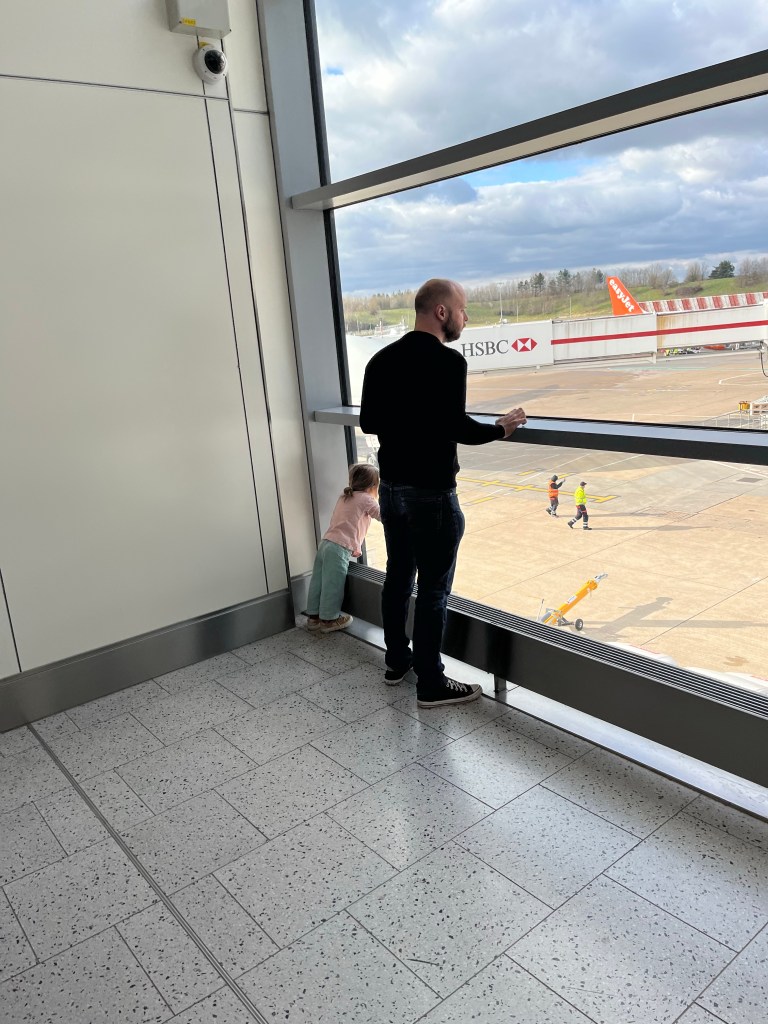John and Tilly looking out at the aircraft